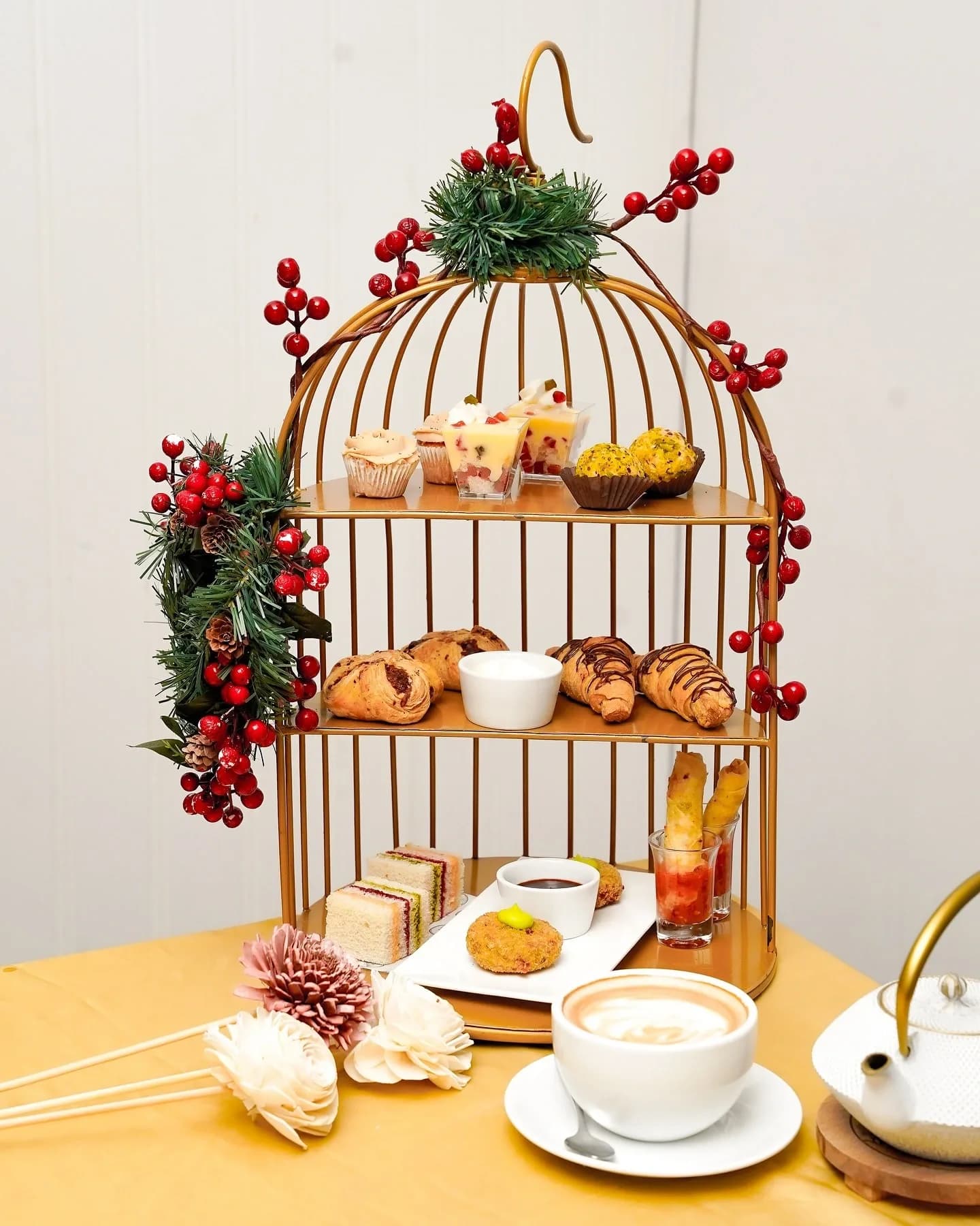 Tiered High Tea stand with pastries, sandwiches and savouries